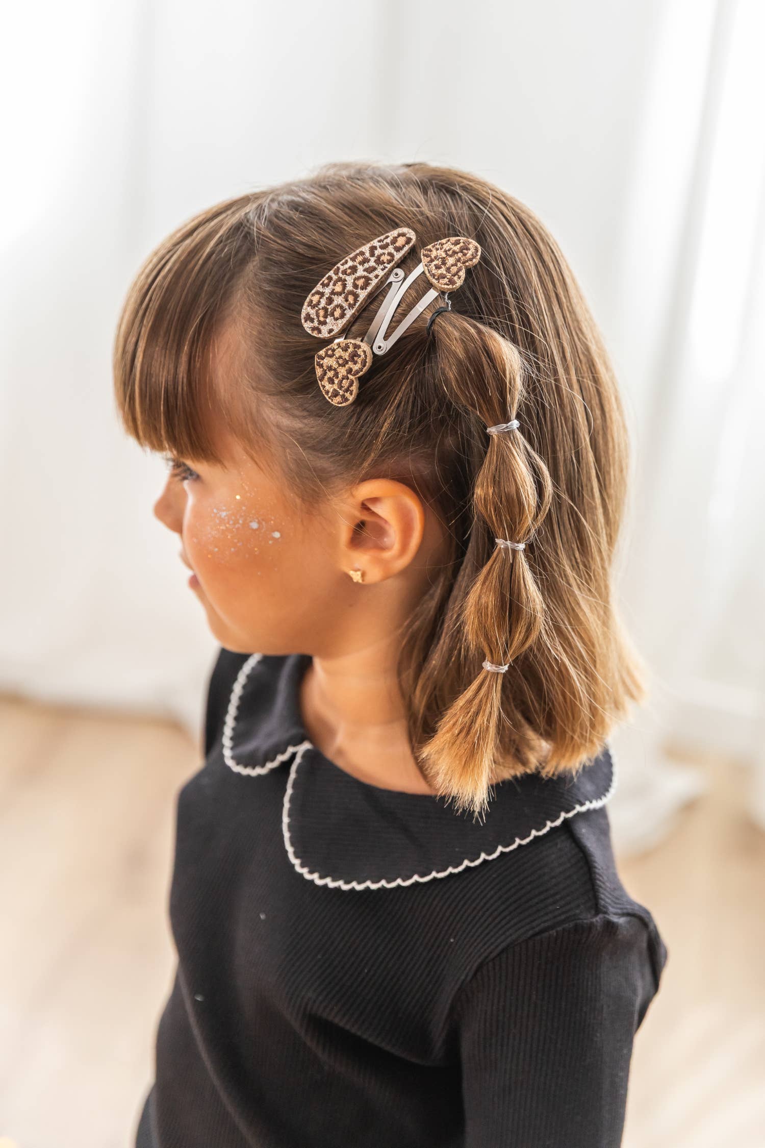 Ganchos de cabelo Leo